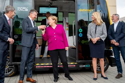 FRANKFURT - Merkel rides Continental EZ10 Robo-Taxi