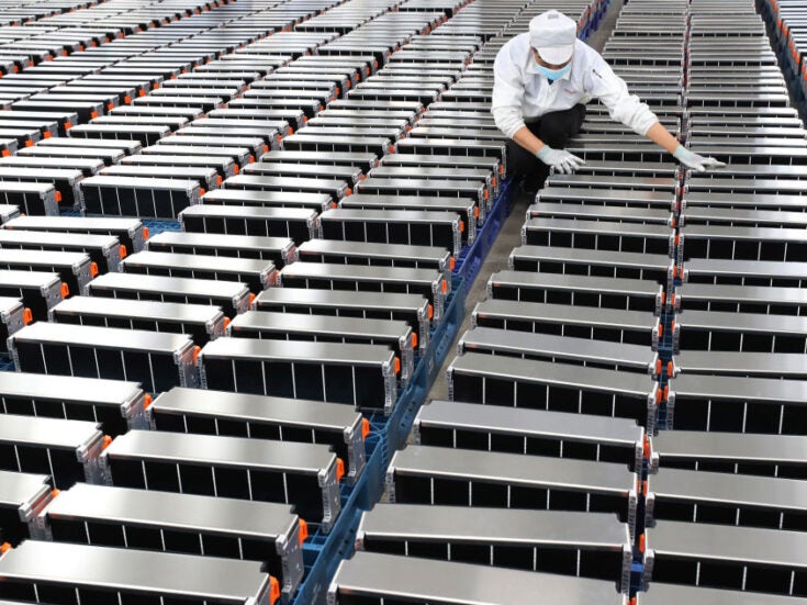 A worker checks parts for the battery packs at a factory of Sunwoda Electric Vehicle Battery in Nanjing in east China's Jiangsu province in March 2021.