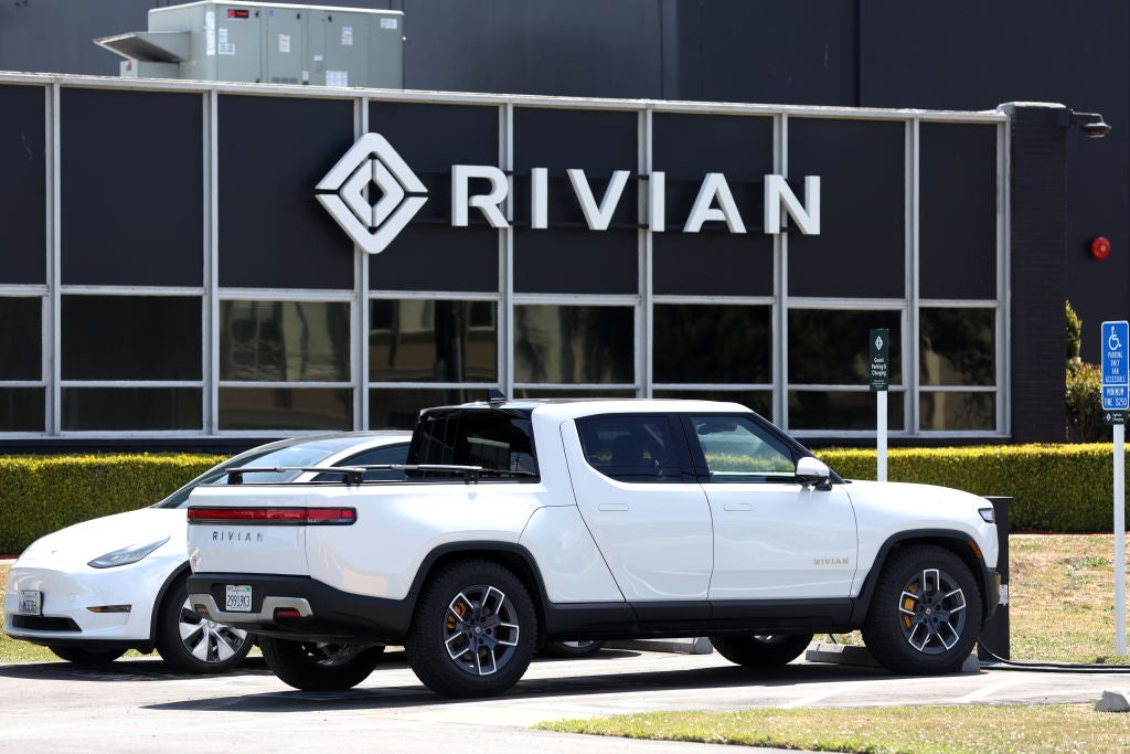 Rivian adopts tesla charging standard - just auto
